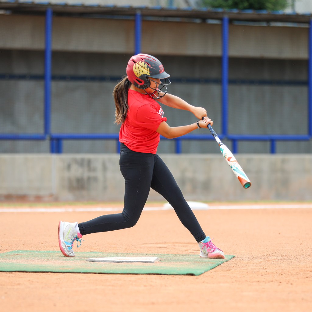 junior player at bat