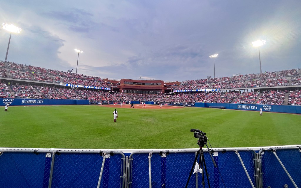 view of the game from the back of the outfield